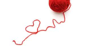 red thread makes heart shape