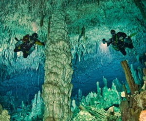 divers in sinkhole