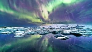 glacier under aurora borealis