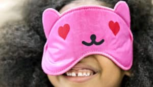 girl in pink cat sleep mask