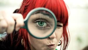 looking through magnifying glass