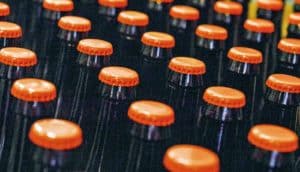 beer bottles with orange caps