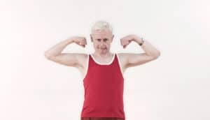 older man flexing (immune systems concept)