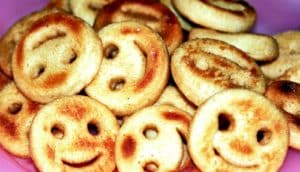 potato smiley faces (overeating concept)