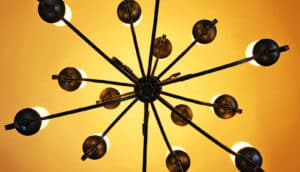 light fixture on orange (neurons concept)