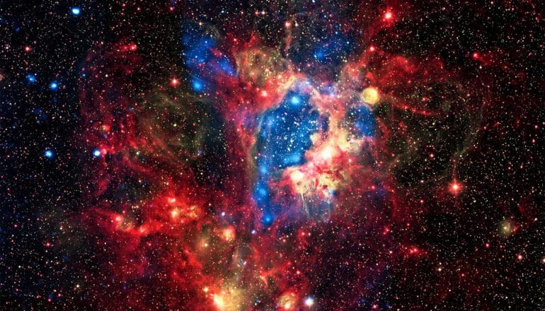 This composite image shows a superbubble in the Large Magellanic Cloud (LMC), a small satellite galaxy of the Milky Way (hubble constant concept)