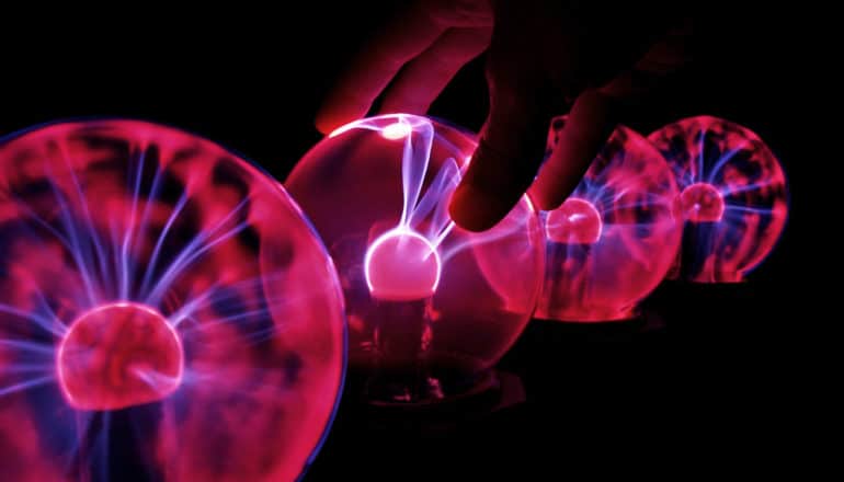 hand on plasma ball (electroporation concept)