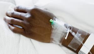 hand of hospital patient with IV - sepsis care