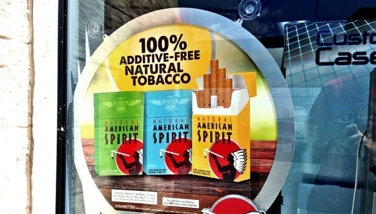 The image shows an ad for Natural American Spirit cigarettes.