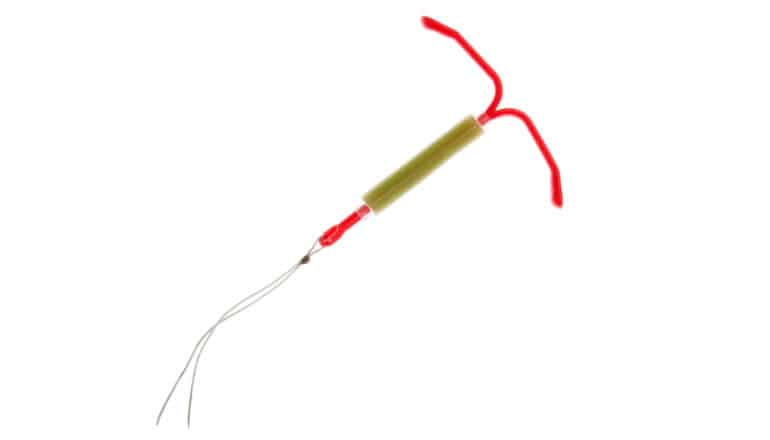 red IUD on white background