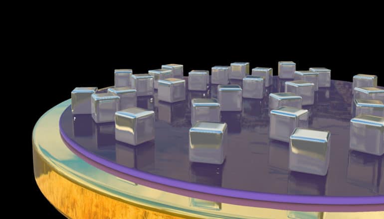 silver cubes scattered across top of multi-layer disk