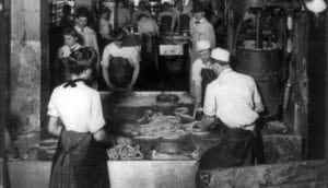 factory workers make sausage