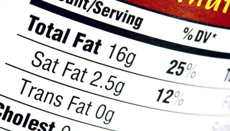 close-up of high-fat food's nutrition facts label