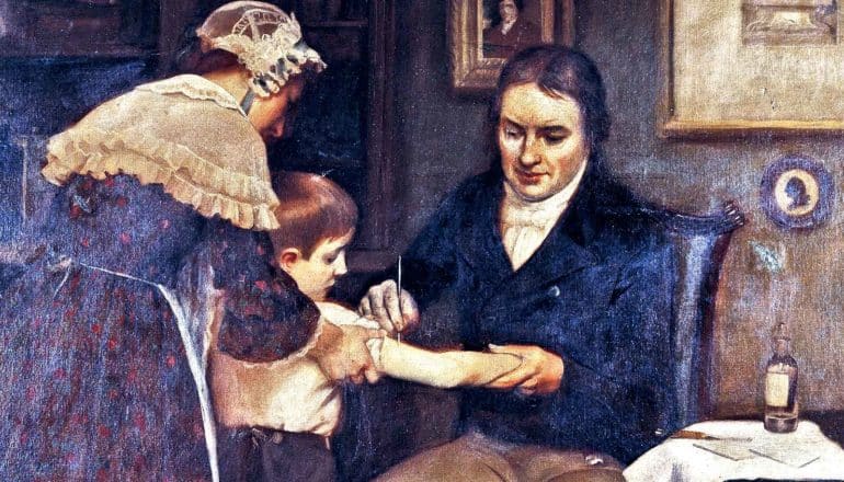 A painting shows Edward Jenner administering an early vaccine to a child