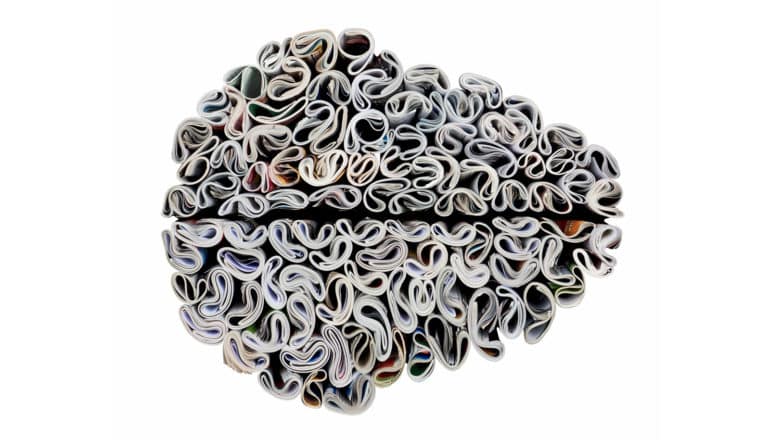 the ends of rolled magazines form brain shape