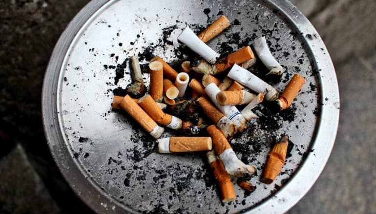 cigarette butts in ash tray