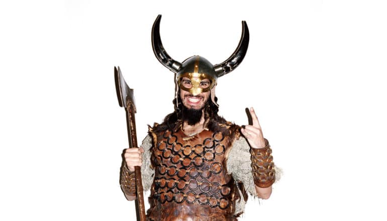 smiling person in Viking costume