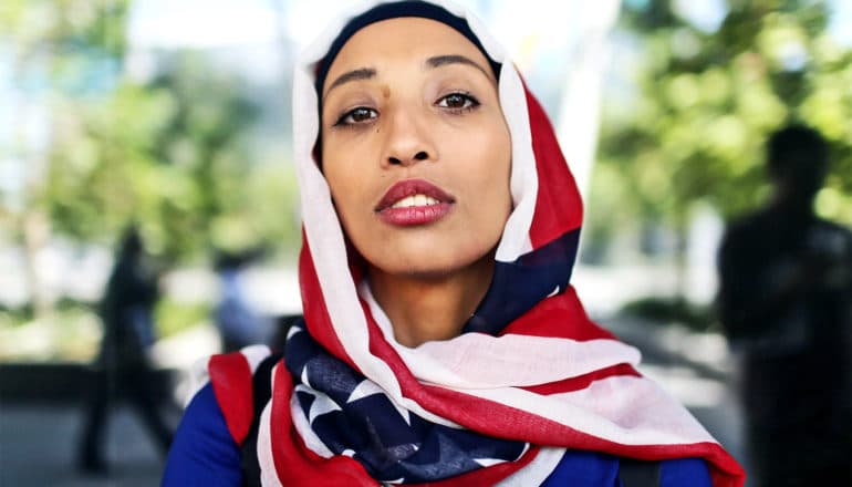 A woman wears an American flag hijab