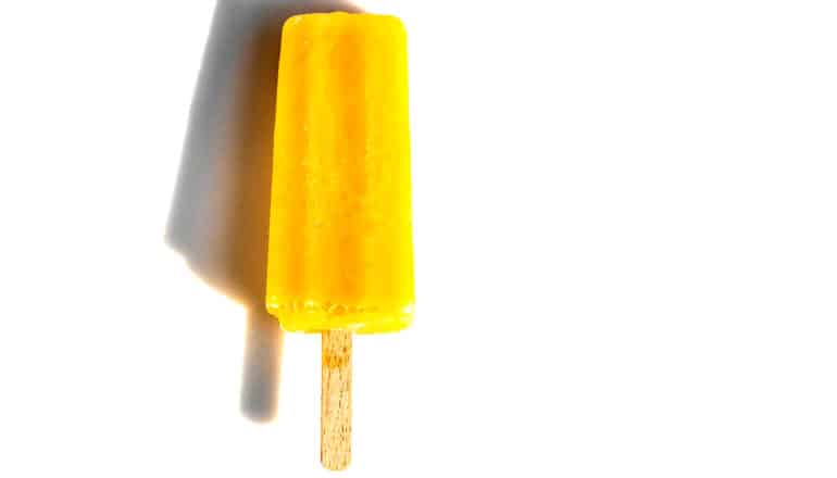 yellow popsicle with shadow