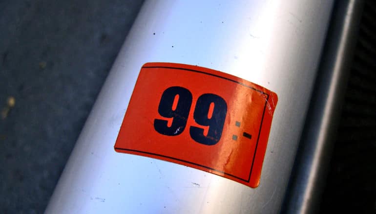 red sticker on metal tube says "99"