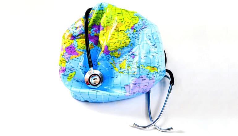 deflated globe with stethoscope