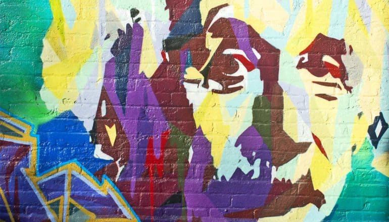 A colorful mural of Albert Einstein's face