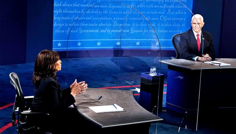 Senator Kamala Harris and Vice President Mike Pence debate from behind plexiglass barriers