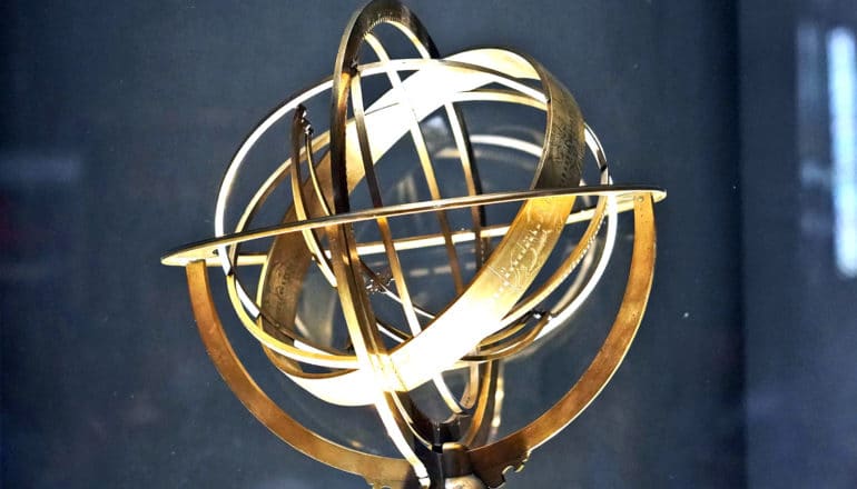 A brass astrolabe, an ancient astronomical tool