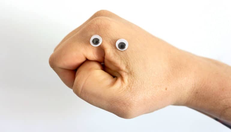 googly eyes on closed fist