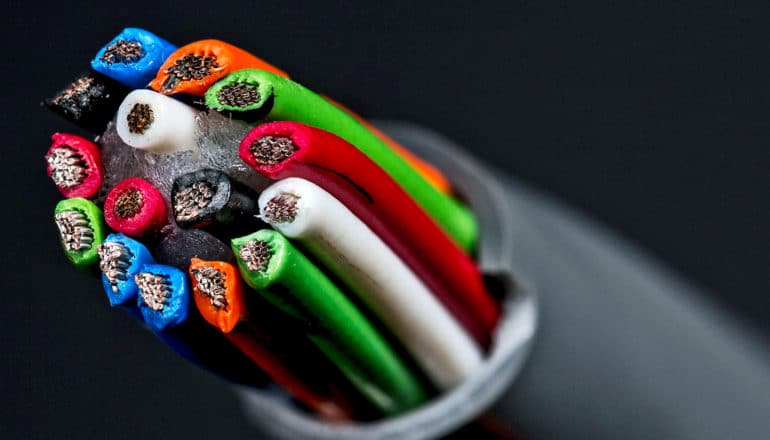 A cut wire with many colored strands