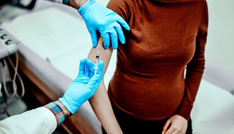 A pregnant woman gets the vaccine