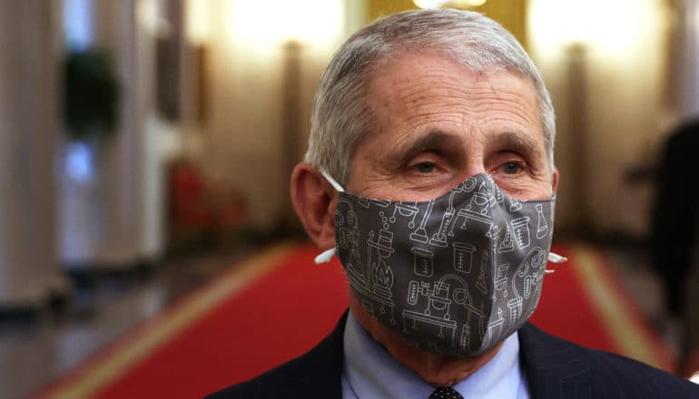 Dr. Fauci in science-themed face mask