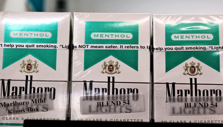 Packs of menthol cigarettes on a store shelf