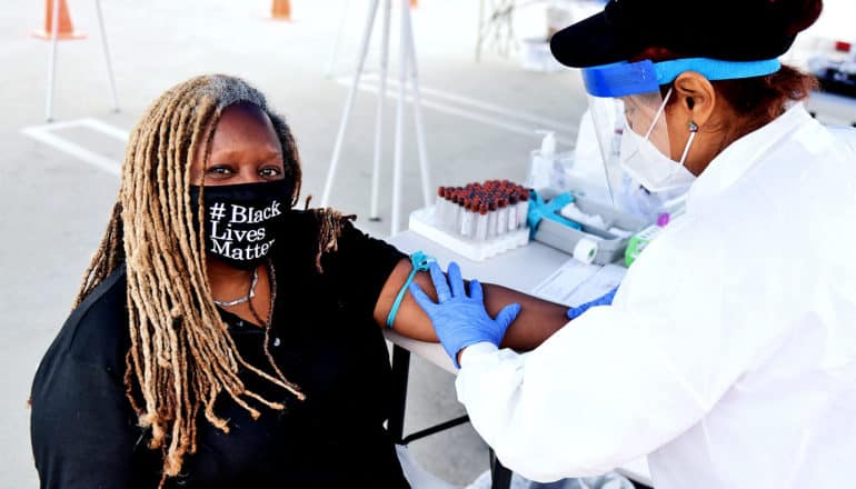 A woman gets a test for SARS-CoV-2 antibodies