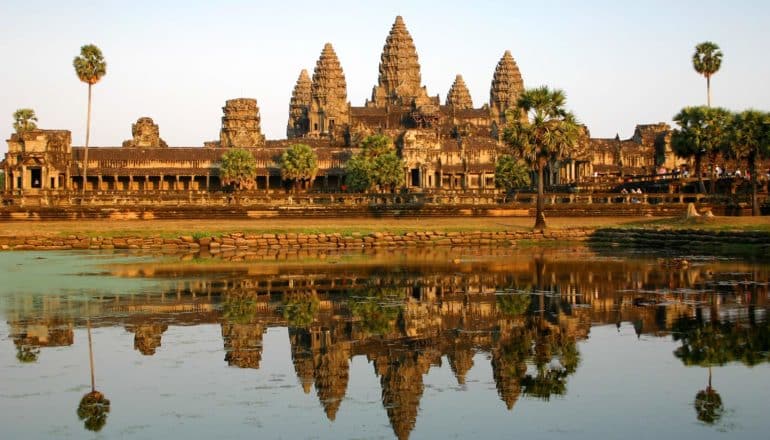 massive khmer temple-city reflects in pool