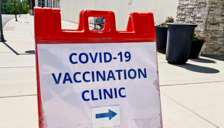 sign says "covid-19 vaccination clinic"