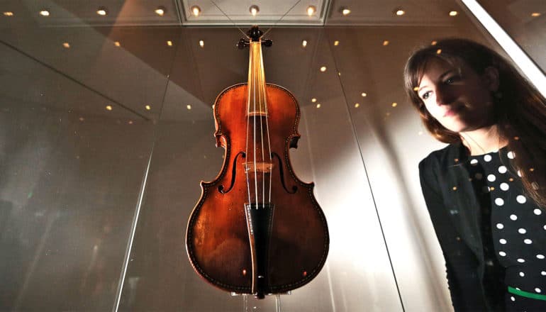 A museum's glass case holds "The Cipriani Potter" violin