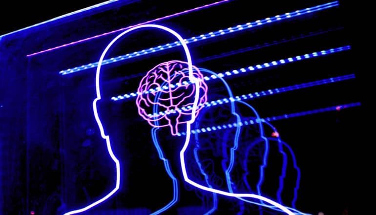 neon outline of human head with brain and horizontal lines