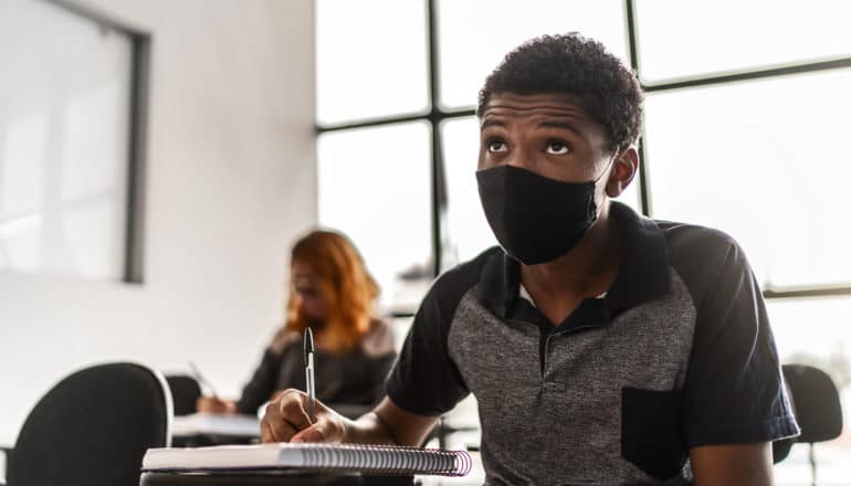 Black student in classroom