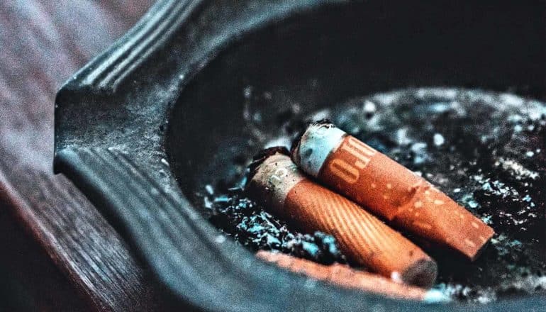 Cigarette butts in an ash tray