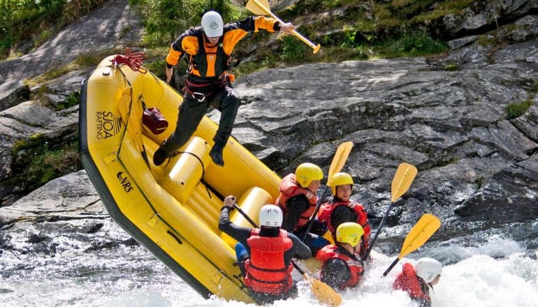 people fall from tipping river raft