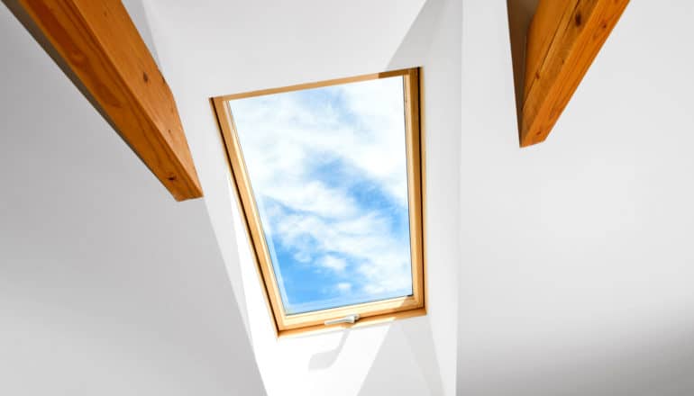 skylight between wood beams