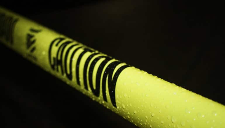 caution tape in the dark