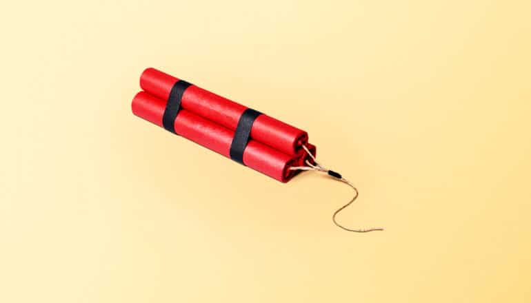 dynamite on yellow background