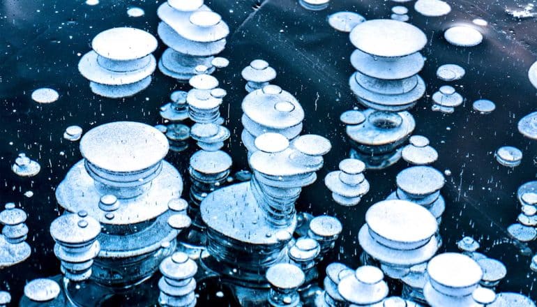 Methane bubbles frozen underwater