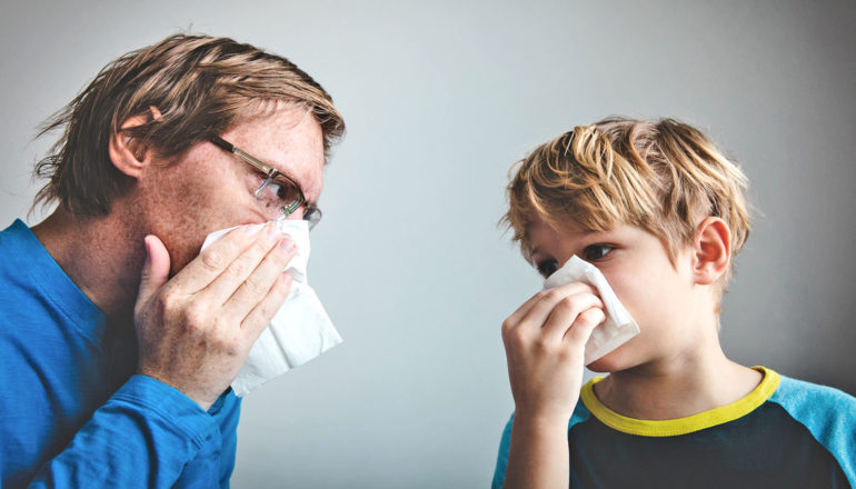 adult and child blow noses