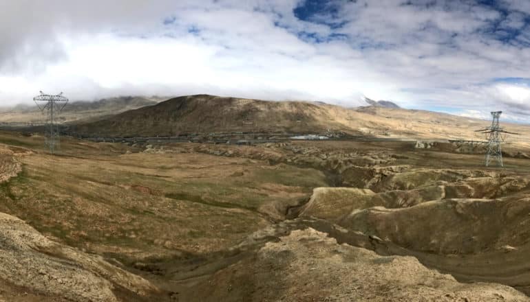 bare plateau with electric towers