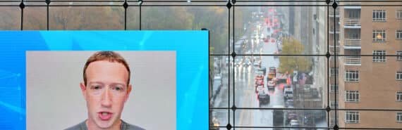 Zuckerberg on screen on window