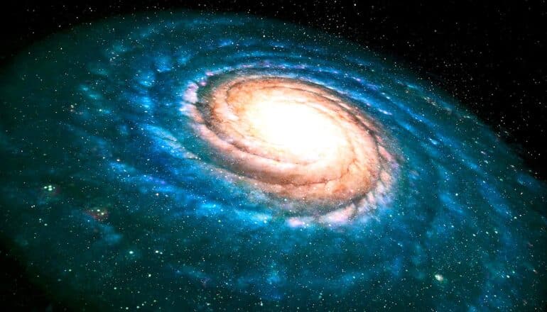 A spiral galaxy illustration showing swirling blue clouds and a bright center.