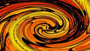 A swirl of orange, yellow, and black color.